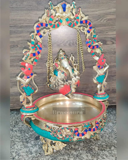 Brassaura™ Artistic Ganapati on Swing with Prabhavali & Large Brass Urli – 14 kgs, 21 Inches Height – Divine Home Decor