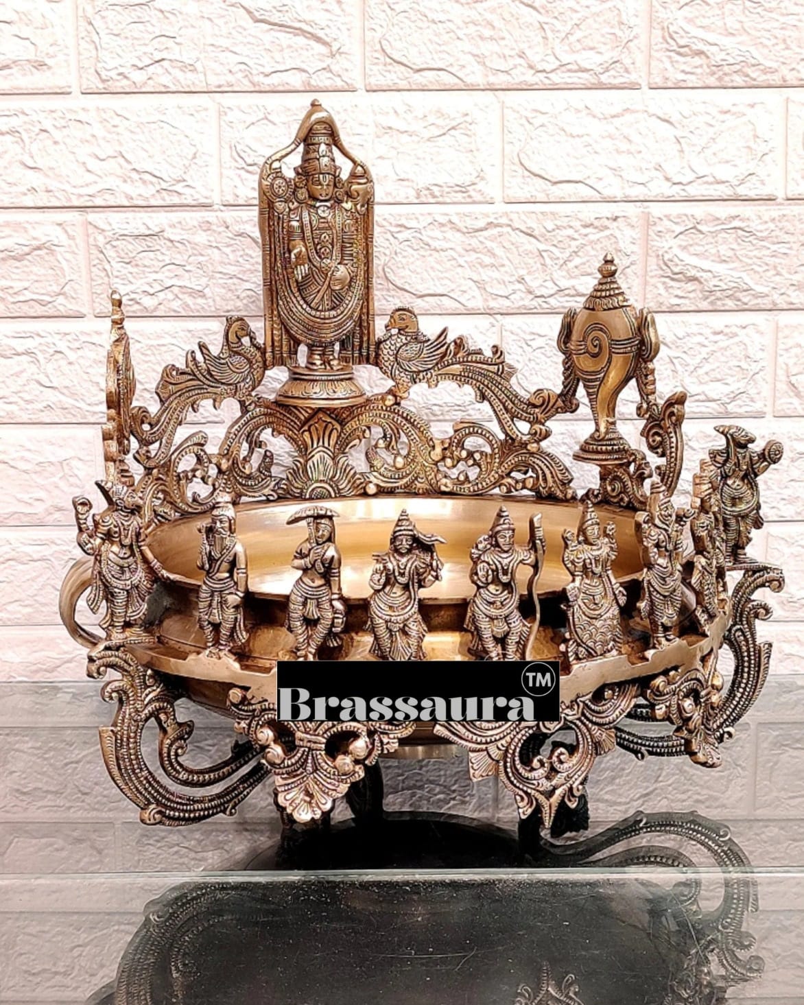 It's a large Traditional Urli with Lord tirupati balaji and 10 incarnations of Lord Vishnu. Material: Superfine Brass Height 16.5 inches Width 17 inches Depth 17 inches Weight 15 kgs