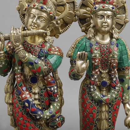 Handcrafted brass statue set of Radha and Krishna, adorned with vibrant inlay or meenakari stonework 17 Inches