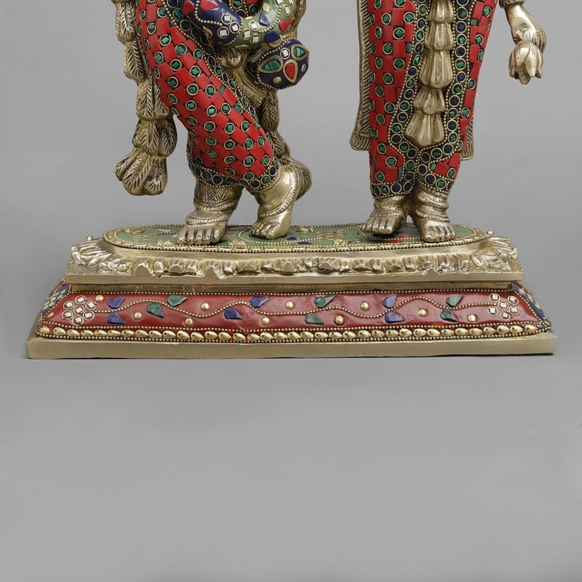 Handcrafted brass statue set of Radha and Krishna, adorned with vibrant inlay or meenakari stonework 17 Inches