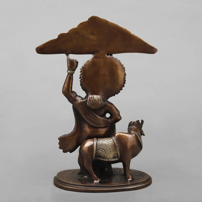 Brassaura® Lord Krishna Lifting Govardhan Parvat Brass Statue | Antique Finish | Height 10 Inches & Weight 2.32 Kgs