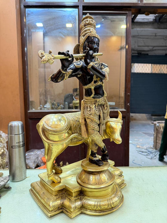 Brassaura® Brass Lord Krishna Playing Flute with Sacred Cow Idol | Dual-Tone Black & Gold Handcrafted Brass Murti for Home Temple, Pooja & Spiritual Décor | Height 26.5 Inches | Weight 26.7 Kg