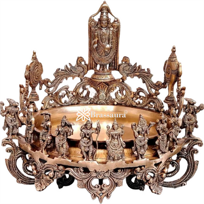 It's a large Traditional Urli with Lord tirupati balaji and 10 incarnations of Lord Vishnu. Material: Superfine Brass Height 16.5 inches Width 17 inches Depth 17 inches Weight 15 kgs