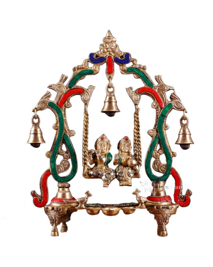 Brassaura™ Brass Radha Krishna Swing Idol with Diyas, Peacocks & Bells – Height 13.5 Inches & Weight 2.4 Kgs | Elegant Devotional Statue