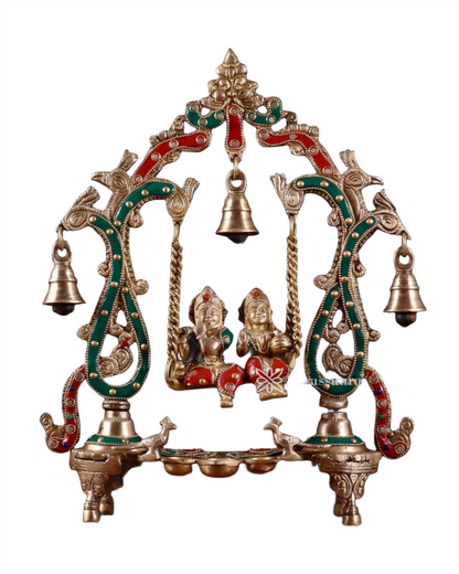 Brassaura™ Brass Radha Krishna Swing Idol with Diyas, Peacocks & Bells – Height 13.5 Inches & Weight 2.4 Kgs | Elegant Devotional Statue