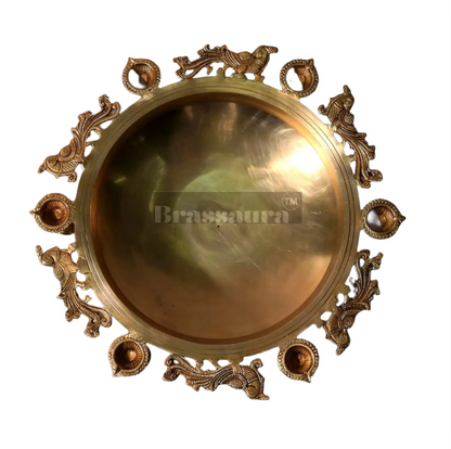 Brassaura™ Magnificent Peacock Brass Urli – 16 kgs, 7.5 Inches Height – Decorative Urli with 6 Diyas & Bells for Home Decor