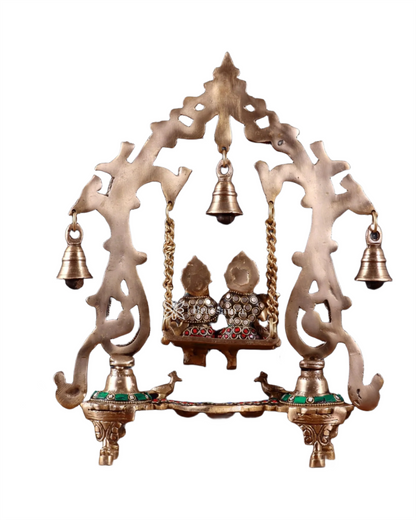 Brassaura™ Brass Radha Krishna Swing Idol with Diyas, Peacocks & Bells – Height 13.5 Inches & Weight 2.4 Kgs | Elegant Devotional Statue