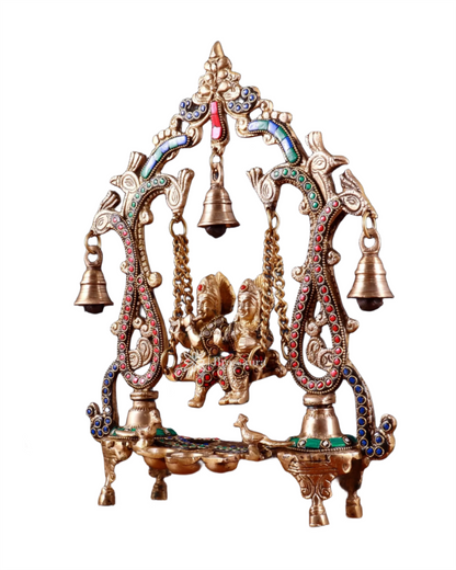 Brassaura™ Brass Radha Krishna Swing Idol with Diyas, Peacocks & Bells – Height 13.5 Inches & Weight 2.4 Kgs | Elegant Devotional Statue