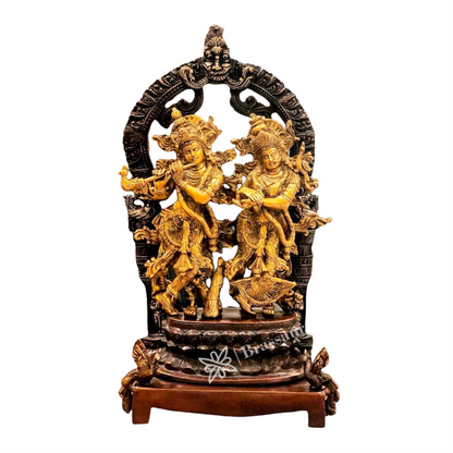 Brassaura™ Brass Radha Krishna Idol Pair with Peacocks & Prabhavali Arch – Height 17.5 Inches & Weight 10 Kgs | Elegant Devotional Sta