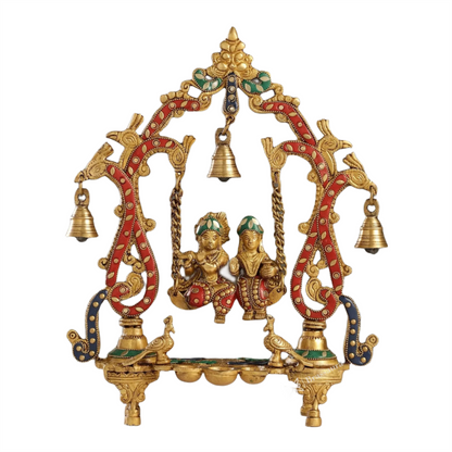 Brassaura™ Brass Radha Krishna on Swing with Diyas, Peacocks & Bells – Height 13.5 Inches & Weight 2.4 Kgs | Elegant Devotional Idol