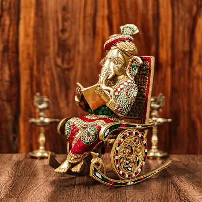 Brassaura™ Brass Ganesha on Rocking Chair Reading Book with Stonework | Height 17 Inches & Weight 15 Kgs
