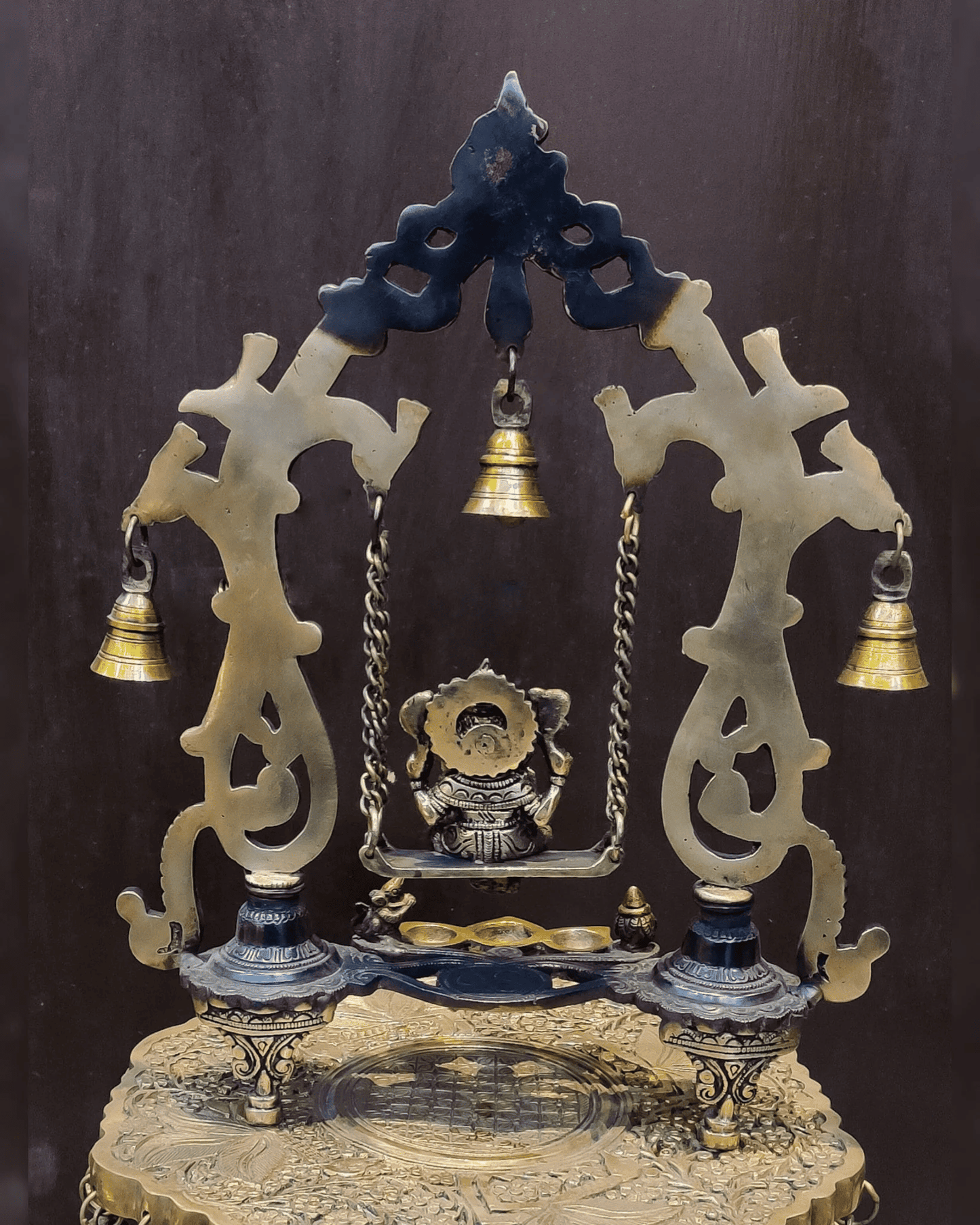 Brassaura® Brass Ganesha on Swing with Three Diyas, Peacocks & Bells | Height 13.5 Inches