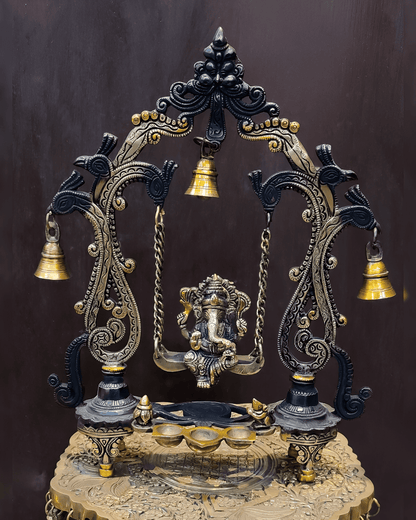 Brassaura® Brass Ganesha on Swing with Three Diyas, Peacocks & Bells | Height 13.5 Inches