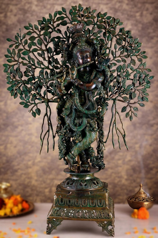Brassaura® Krishna Muralidhari Brass Idol Under Sacred Tree | Antique Gold Finish with Green Leaves | Pure Solid Brass Handcrafted Murti for Home Temple, Spiritual Décor & Gifting | Height 35 Inches | Weight 31 Kg
