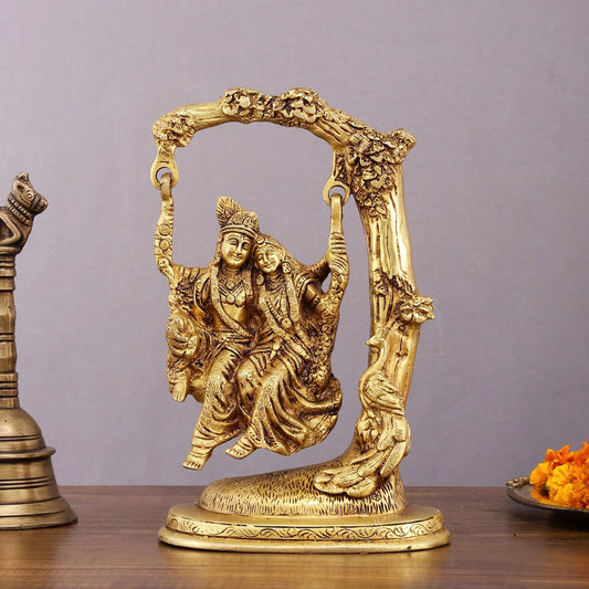 Brassaura™ Pure Brass Radha Krishna Swing – 10.5" Height | 3.10 kg – Divine Tree-Hung Idol for Home Décor