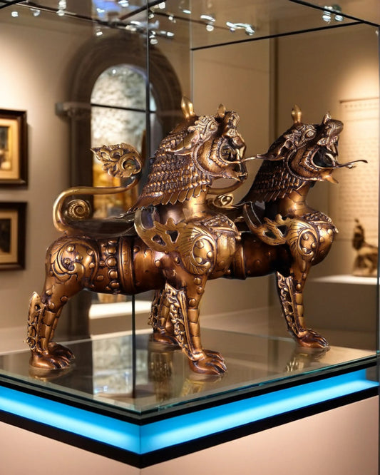 Brassaura™ Pair of Tibetan Snow Lion Statues in Vintage Brass | Handcrafted Himalayan Décor | Total Weight 40 Kgs | Height 14.5 Inches