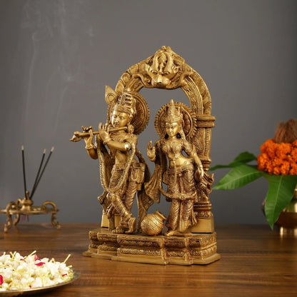 Brassaura™ Handcrafted Radha Krishna Brass Idol with Yali Prabhavali – 14 Inch Height, 7.5 Kg | Divine Flute & Butter Pot Detail